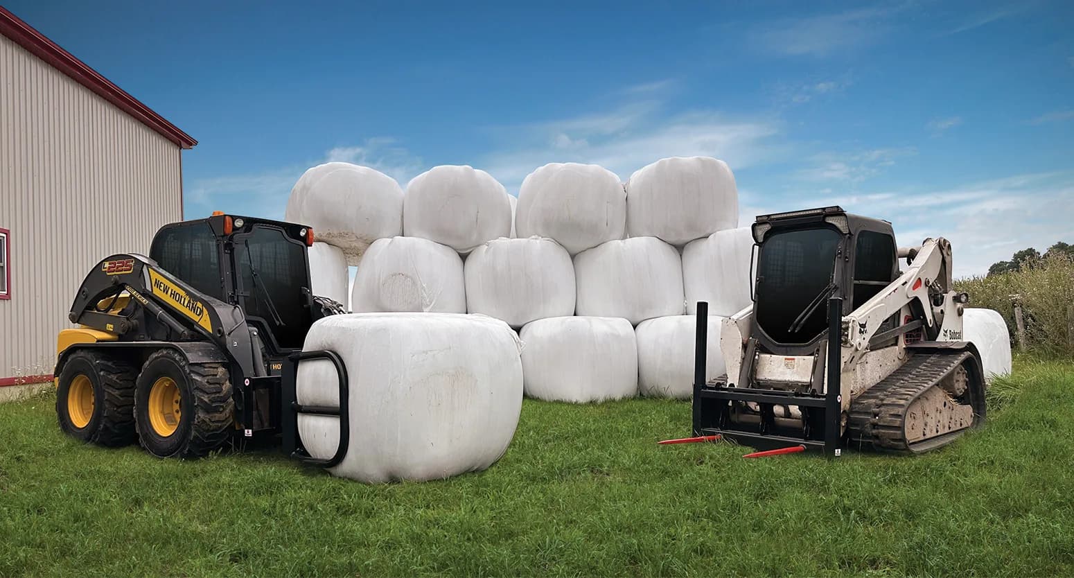 Two skid steers moving wrapped round bales with a bale squeezer